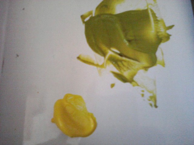 yellow paint mixed with black paint