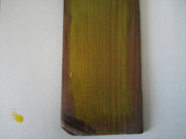 painting wood with yellow paint that became transparent