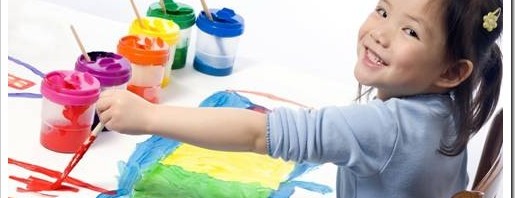 child painting with many colors