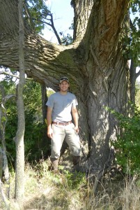 Photo of Brent Macolley, Environmental Scientist at MAD Scientist & Associates, standing next to a tree.