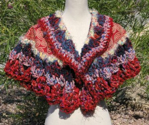 Designer hand knitted wearable art - the Mezza Luna Wrap, sold by Blackberry Bear on Etsy.