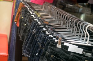 Clothing rack with denim pants and shorts from http://www.publicdomainpictures.net/view-image.php?image=19781&picture=clothing-rack&large=1