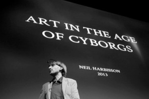 Neil Harbisson giving presentation, "Art in the Age of Cyborgs" in 2013.