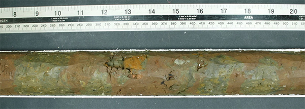 Contrasting colors in core sample sediment layers