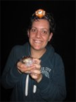 Christina Kindermann photo with a frog on her head and in her hand