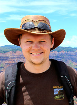 Photograph of soil scientist Jason James in the field